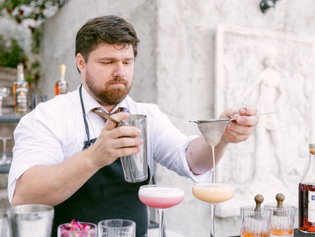Eye-level view of a sleek mobile bar setup with elegant cocktail glasses