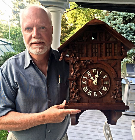 black forest clock, black forest clocks, cuckoo clock, trumpeter clock, flute clock, monk clock. organ clock