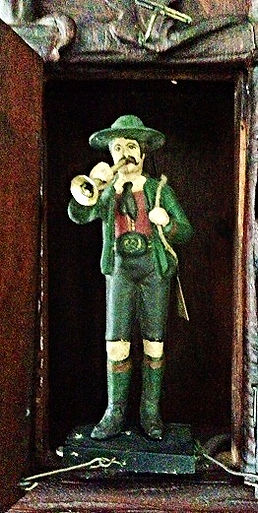 black forest clock, black forest clocks, cuckoo clock, trumpeter clock, flute clock, monk clock. organ clock