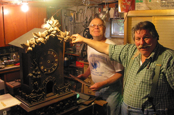 black forest clock, black forest clocks, cuckoo clock, trumpeter clock, flute clock, monk clock. organ clock