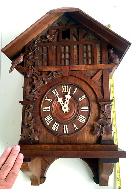 black forest clock, black forest clocks, cuckoo clock, trumpeter clock, flute clock, monk clock. organ clock