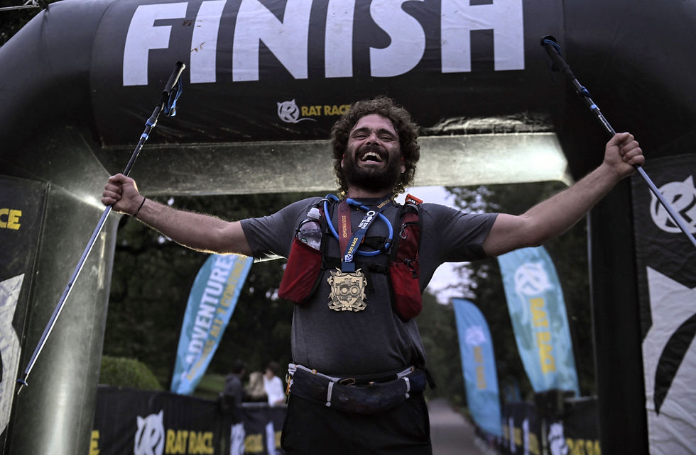 Man finishing 100 mile rat race