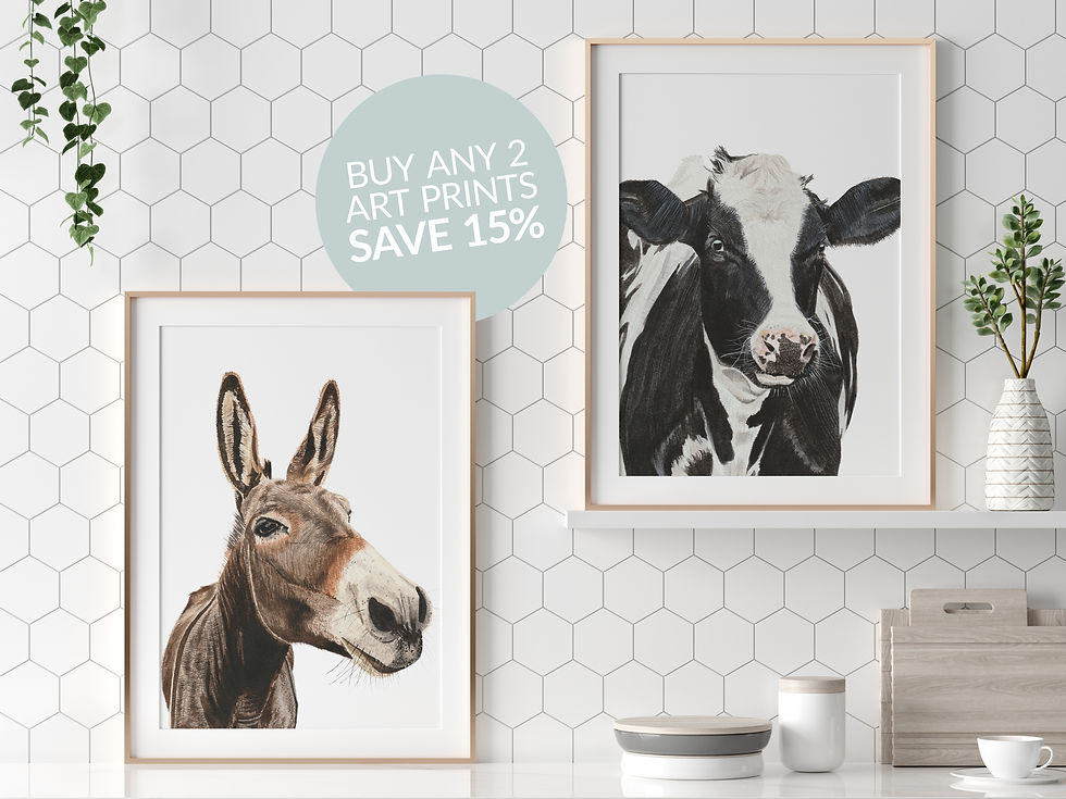 Thumbnail: Watercolour portraits of a donkey and Friesian cow in gold frames with white mounts hung on a white tiled kitchen wall