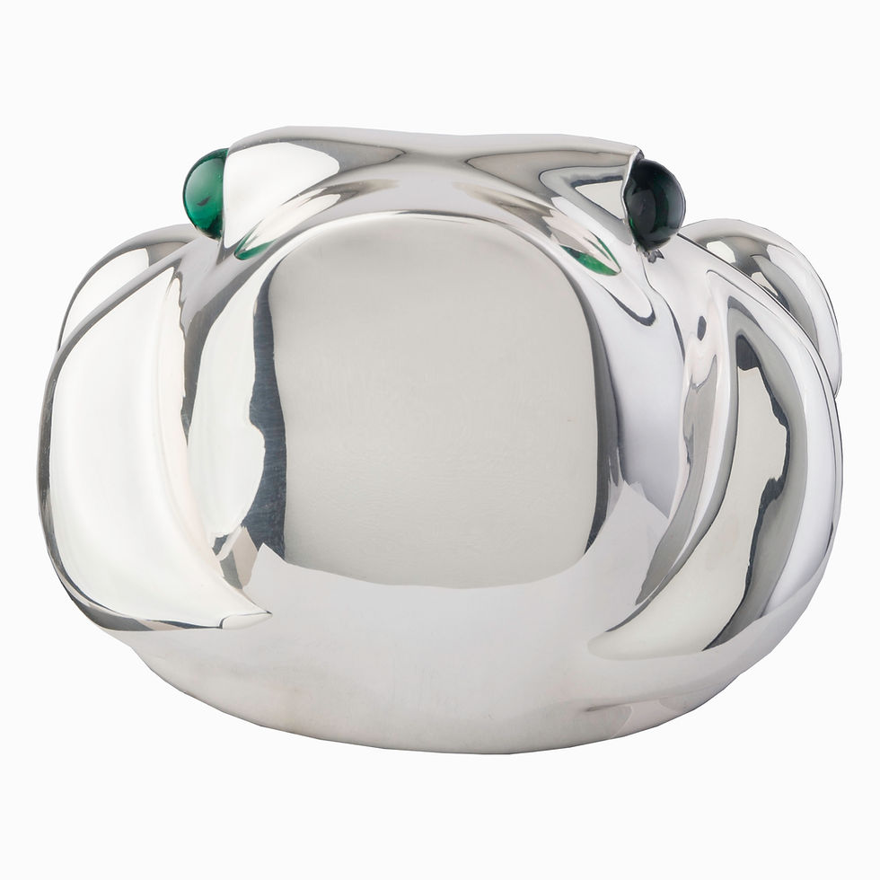 Thumbnail: Silver frog sculpture with green eyes