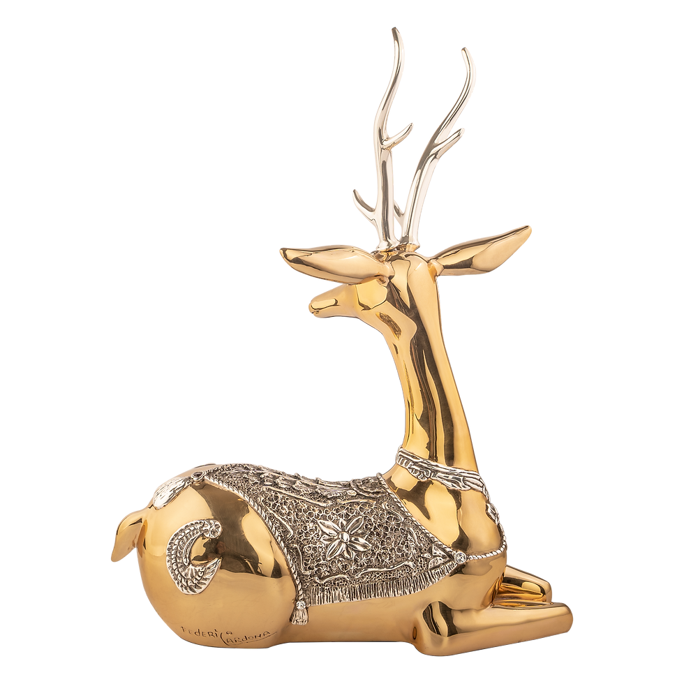 A resplendent golden deer sculpture with intricate silver filigree detailing and elegant antlers, capturing a serene poise that embodies the beauty of wildlife in a luxurious home decor piece.