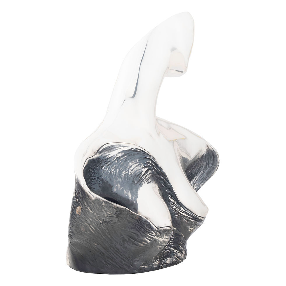 Silver sculpture, wave-like form