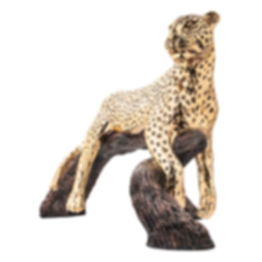 Gold leopard statue perched on branch