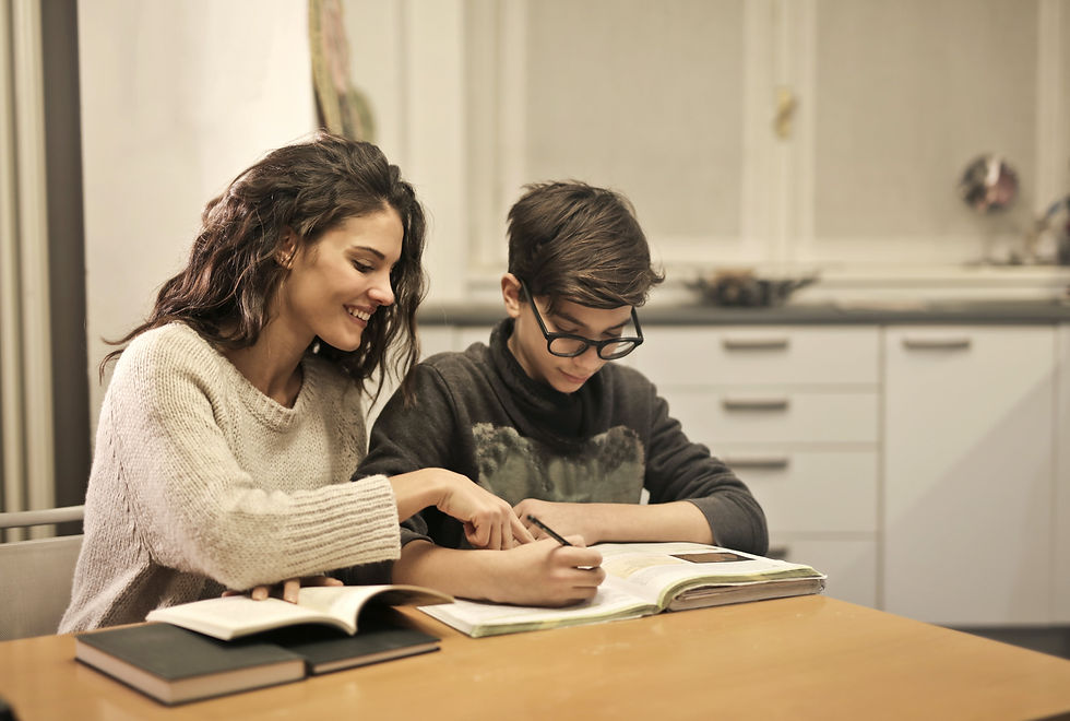 Parent helping child with studies