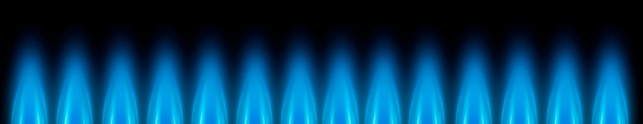 Blue gas flames as banner against dark background.jpg