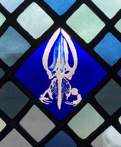 The Tay Whale, recalling the biblical story of Jonah and the whale. Detail in Window 4: The Firmament in the church of Saints Leonard and Fergus, Dundee, Scotland. Designed and made by AJ Naylor.