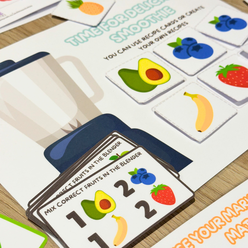 Thumbnail: Close-up of the smoothie-making activity from the Fruity Fun Adventure Book, featuring fruit cutouts, and recipe cards.