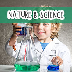 Smiling child doing science experiment with beakers.