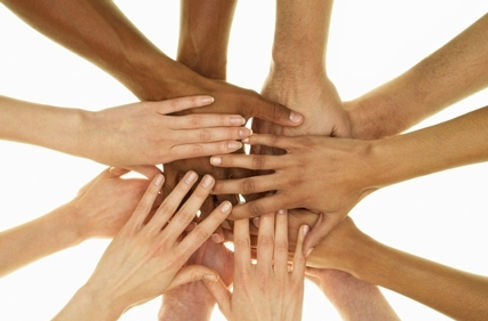 Joining hands in teamwork and collaboration