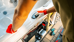 PowerMeans Electric technician installing code-compliant wiring for a backyard hot tub in Central Texas. Setup includes GFCI protection, proper bonding, and weather-rated conduit for long-term safety.
