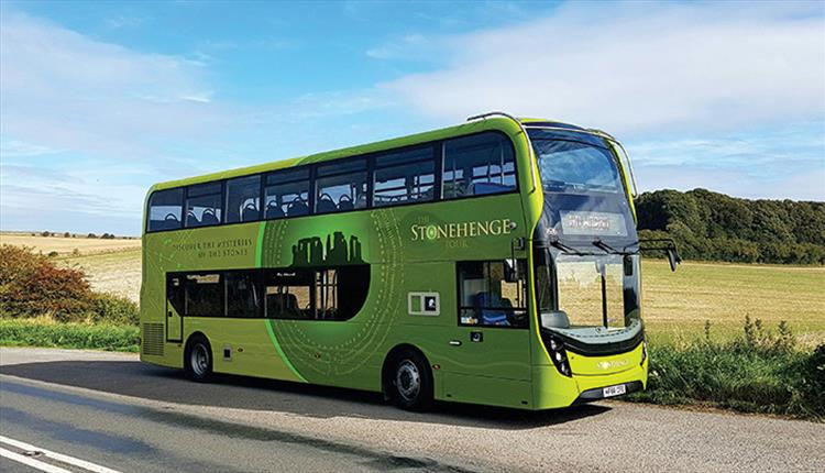The Stonehenge Tour sightseeing bus offering transport from Salisbury to Stonehenge and Old Sarum in Wiltshire.
