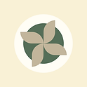biege colored pinwheel inside a green circle with a white halo around the outside