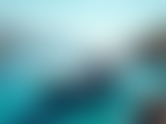 Sleek white yacht anchored near rocky coastline for a weekend getaway