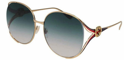 Gold-framed Gucci sunglasses with gradient lenses and striped temples.