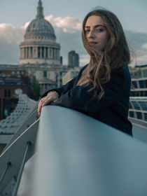 Woman posing with St Paul's Cathedral in the background