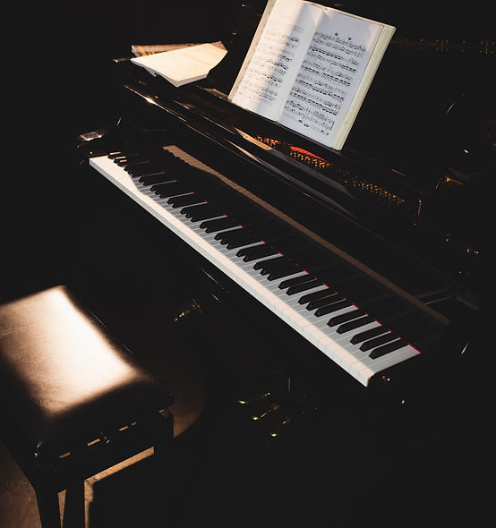 piano-with-musical-books.jpg