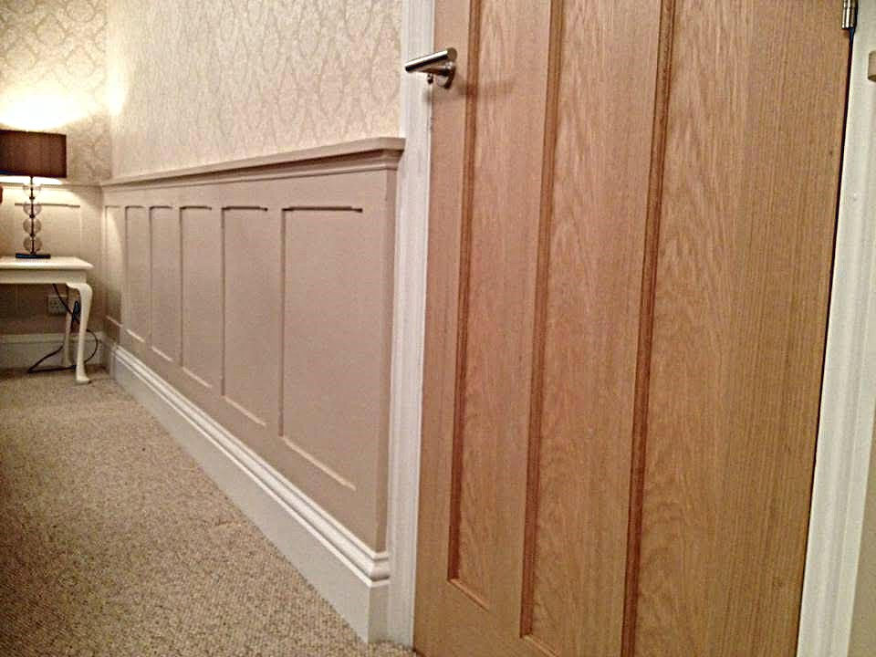 Interior door and panelling