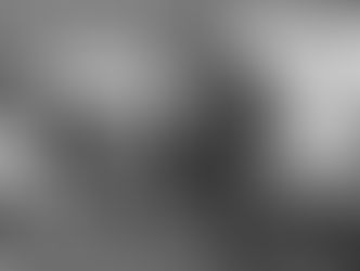 Sekelompok pemburu di lokasi perkemahan memamerkan hasil tangkapan berupa kelinci dan ikan, tahun 1909. (Wikimedia Commons).