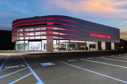 Twilight photo of the new Porsche dealership on PCH in Newport Beach, Orange County