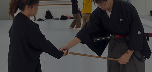 ENZAN IAIDO | Iaido is an art emphasizing precision of technique. Iaido instructor Billy Yong refines a trainee's technique.