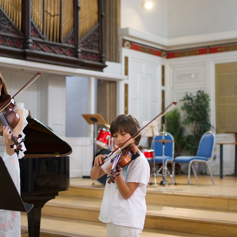 Solo piano performance at Cambridge Music Therapy Summer Concert
