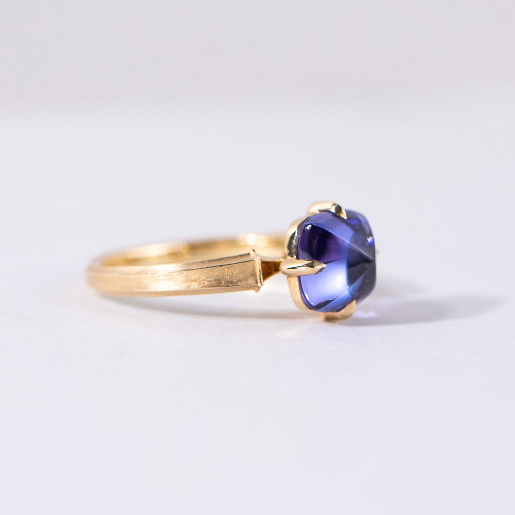 Tinge Sugarloaf cut Tanzanite Ring