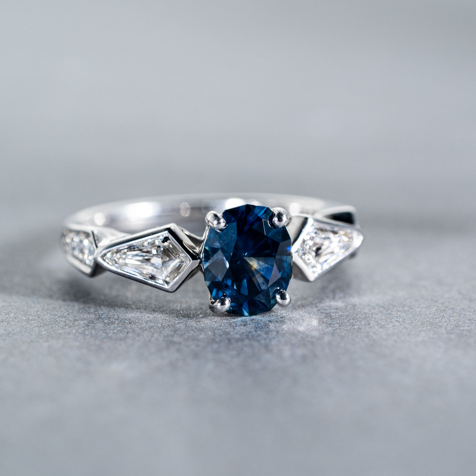 Fancy Oval Montana Sapphire Ring with Shield-cut Diamond