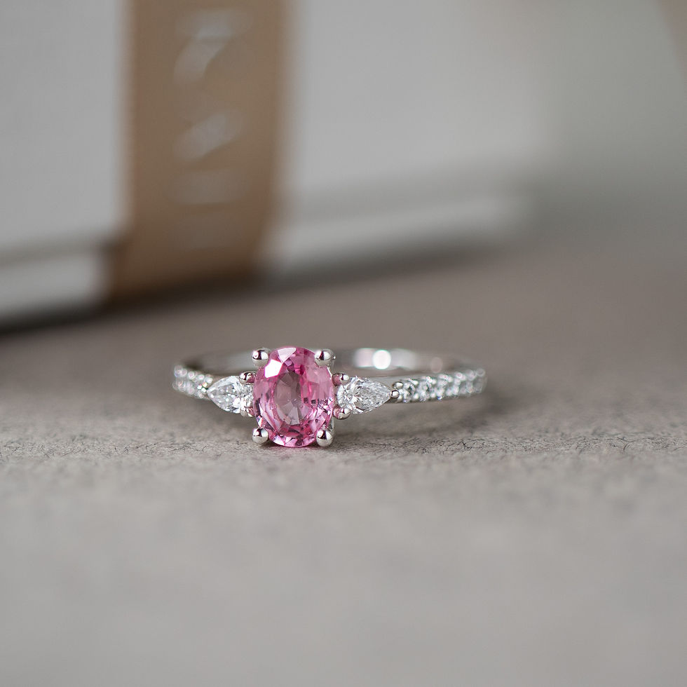 Thumbnail: Padparadscha Sapphire Ring with Pear-shaped Diamond
