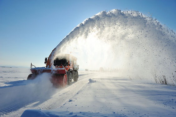 Snowplow Clearing Road