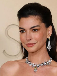 Atriz - Anne Hathaway
