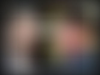 Elon Musk and Mark Zuckerberg intensely staring at each other.