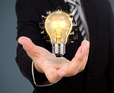 businessman-with-light-bulb-his-hand-min.jpg