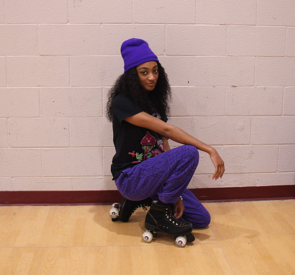 Junior, Trinity Evans, wearing purple for Color Wars