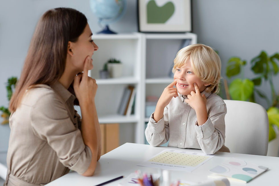woman-doing-speech-therapy-with-little-blonde-boy.jpg