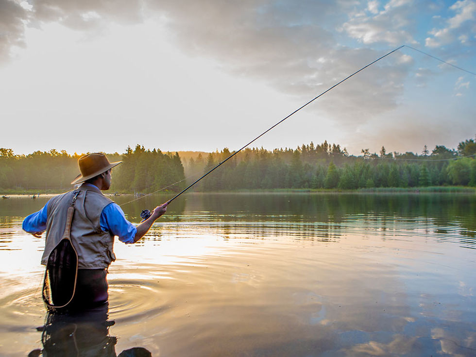 Man-fly-fishing-at-sunset.jpg
