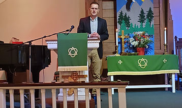 Luke Richards in pulpit 2.jpg
