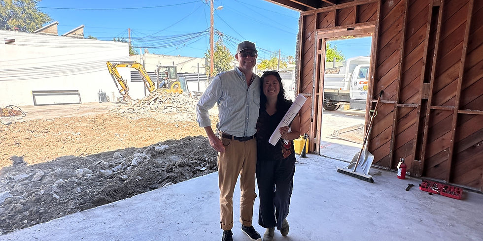 Executive Director Anchi Mei and Board Member Ron Troyano as the new MAKE Cafe build breaks ground.