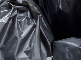 black bin bag waste piled up ready for buckinghamshire waste management company cws.jpg