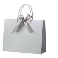 rope handle with ribbon closure
