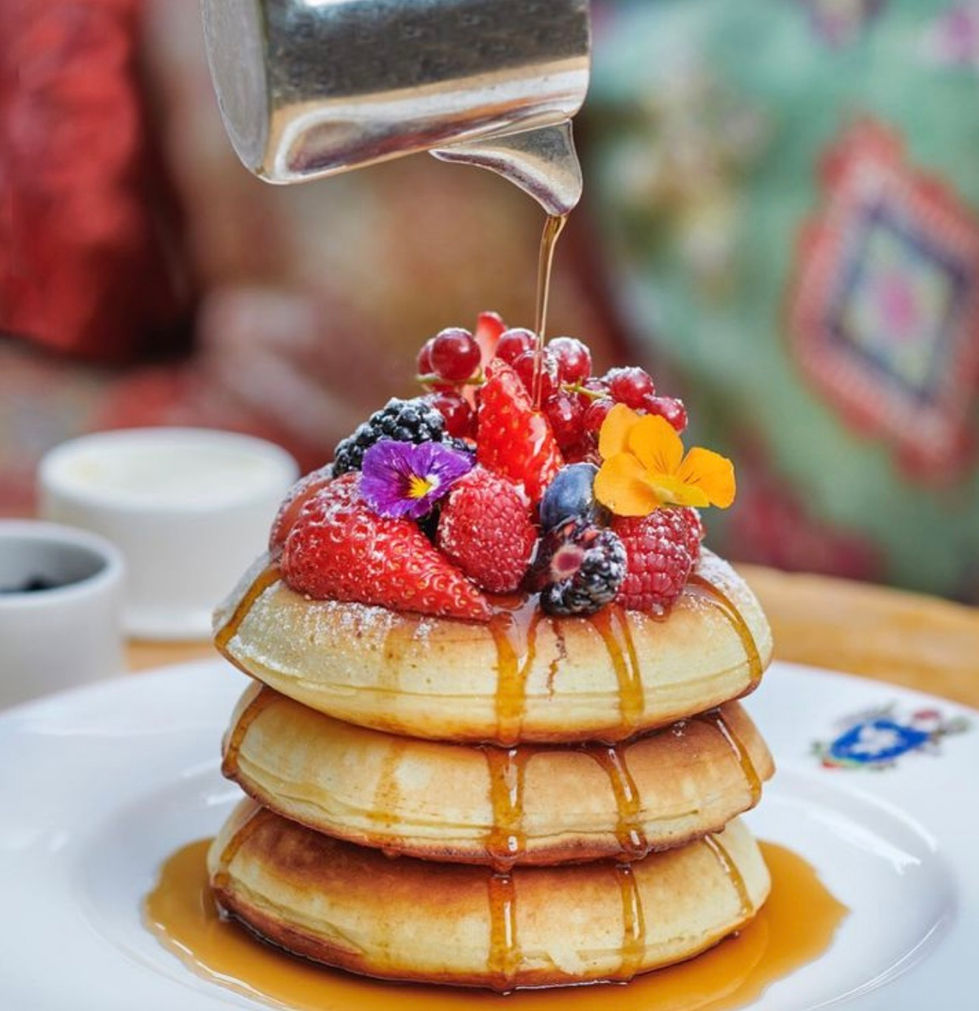 Annabel's private member's club in Mayfair, London, UK. Garden Restaurant, breakfast pancakes and fruit. Menu
hospitality consultancy by Ryan Brown