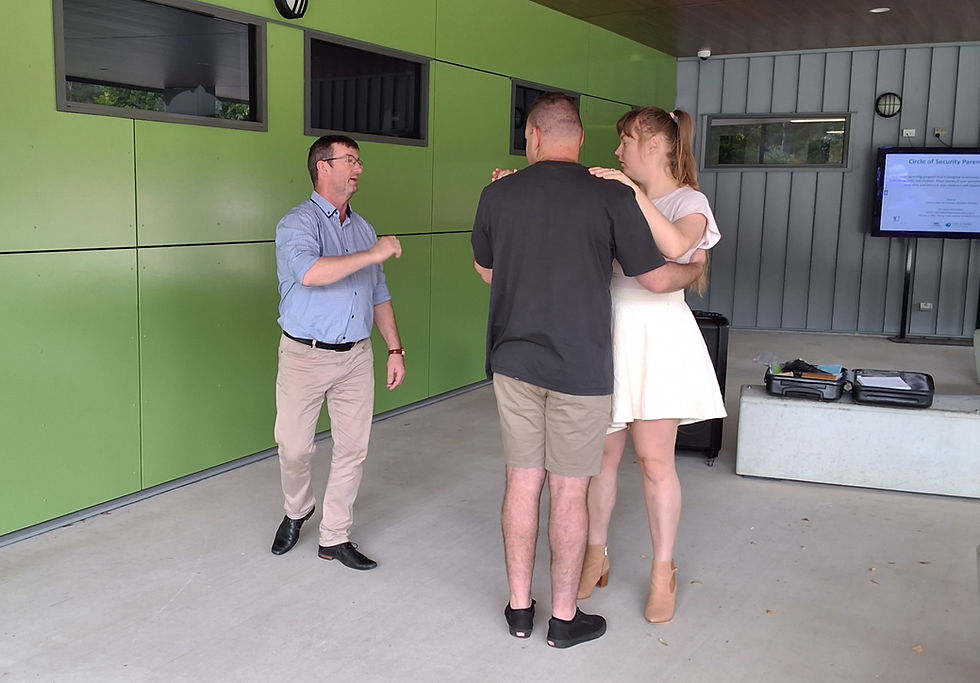 Engaged couple in a lesson dance with guidance.