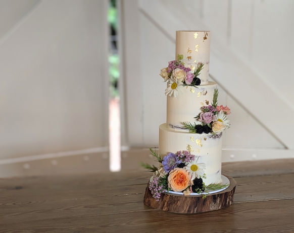 Semi-naked wedding cake at East Riddlesden Hall