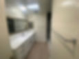 Modern bathroom at 1025 S Holt apartments with dual vanity