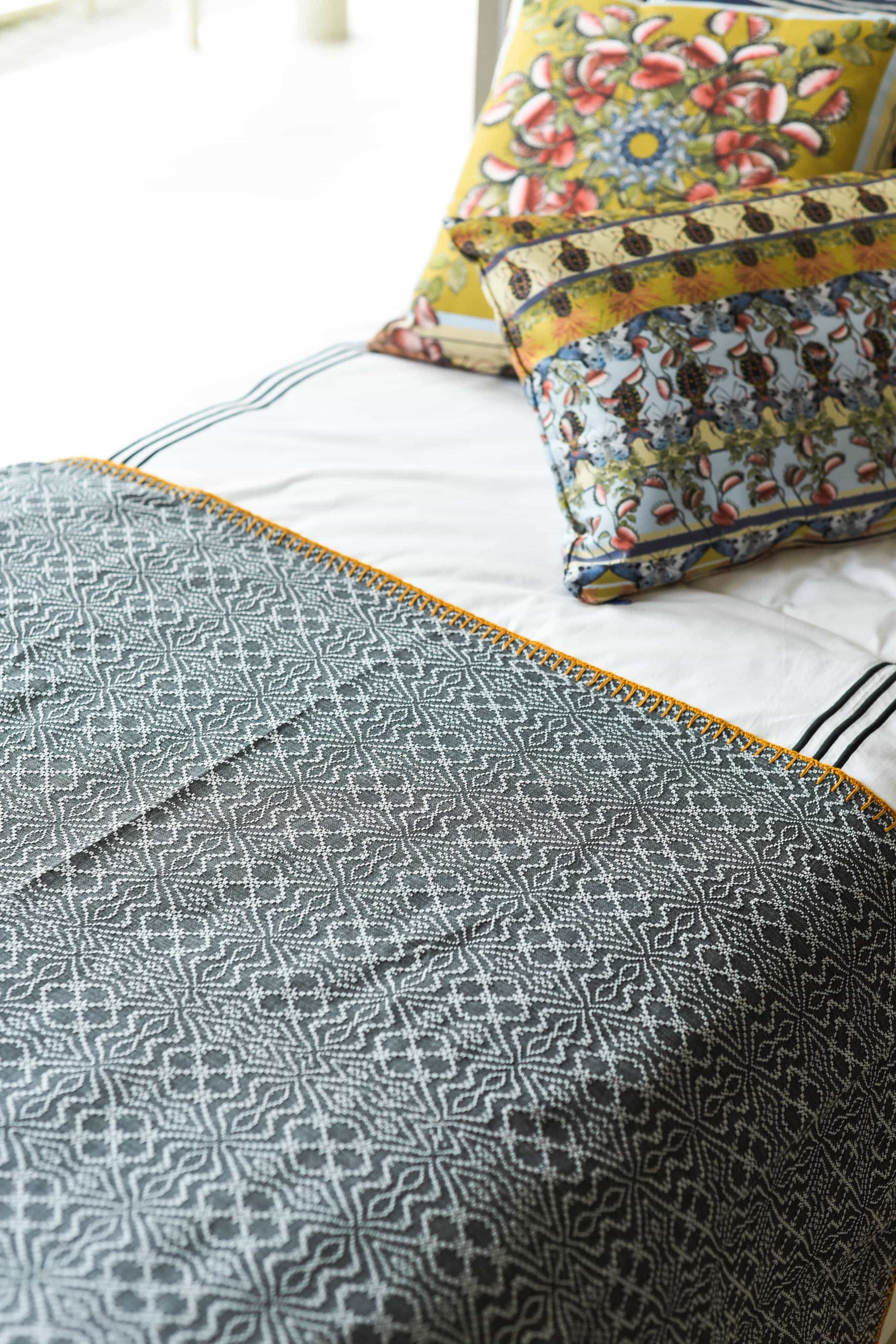 Takipsilim Throw Blanket