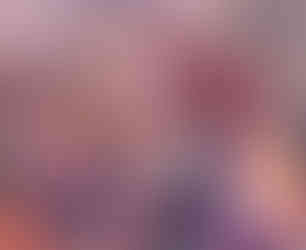 Governor Leavitt sits with a group of students