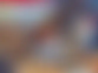 Animated business owner working on his laptop, visually emphasizing the urgency of disaster preparedness with a sign on the wall that reads "Emergency, Activate Disaster Recovery Plan"